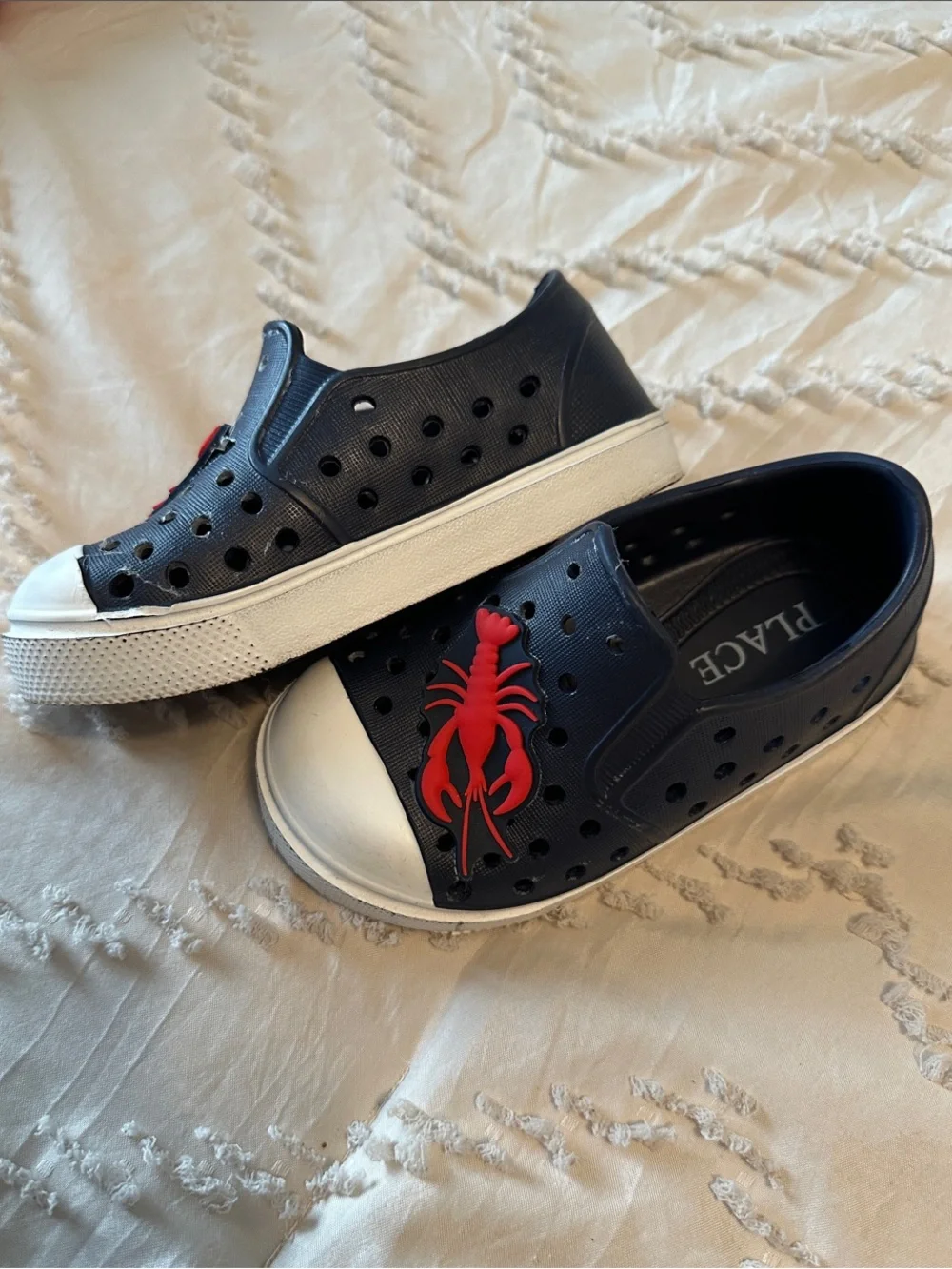 The Children's Place Navy Slip-On Sneakers with Red Lobster Accents